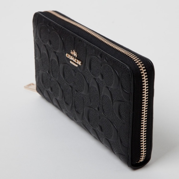 Coach Handbags - EUC Coach Zip Around Black Leather Wallet F53834
